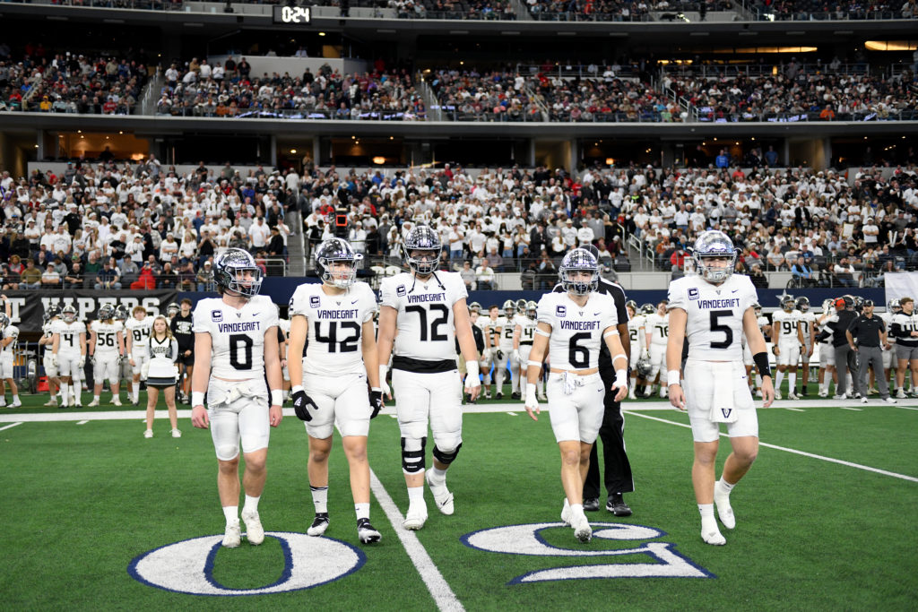 Vandegrift HS football players take the field