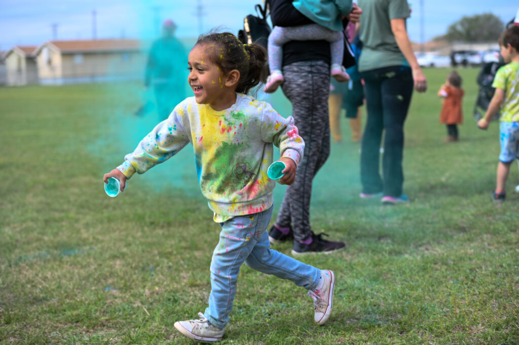 students and families enjoying the festival of colors