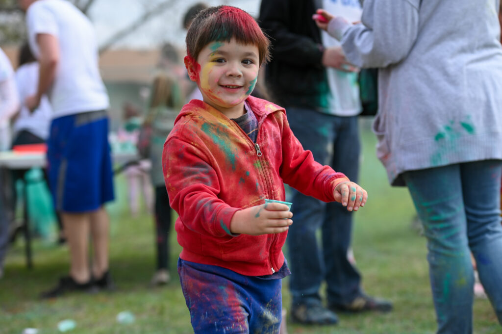 students and families enjoying the festival of colors