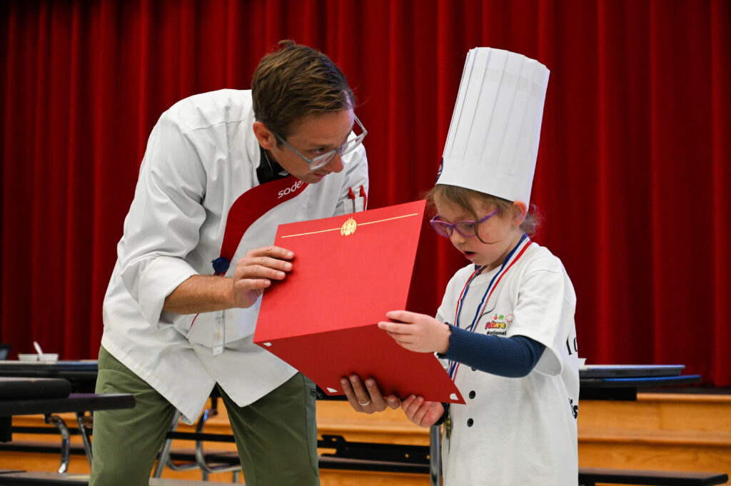 LISD elementary student with staff