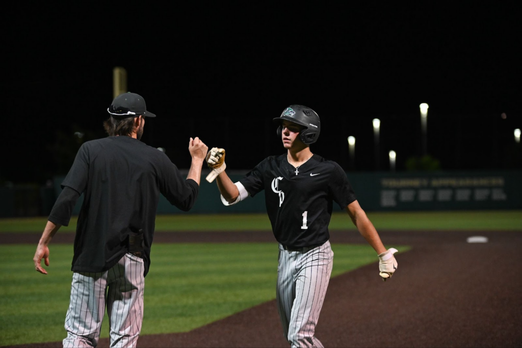 LISD Cedar Park High School baseball player with coach.
