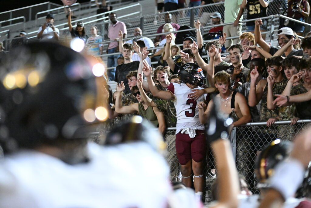LISD football game with Rouse HS fans in the stands