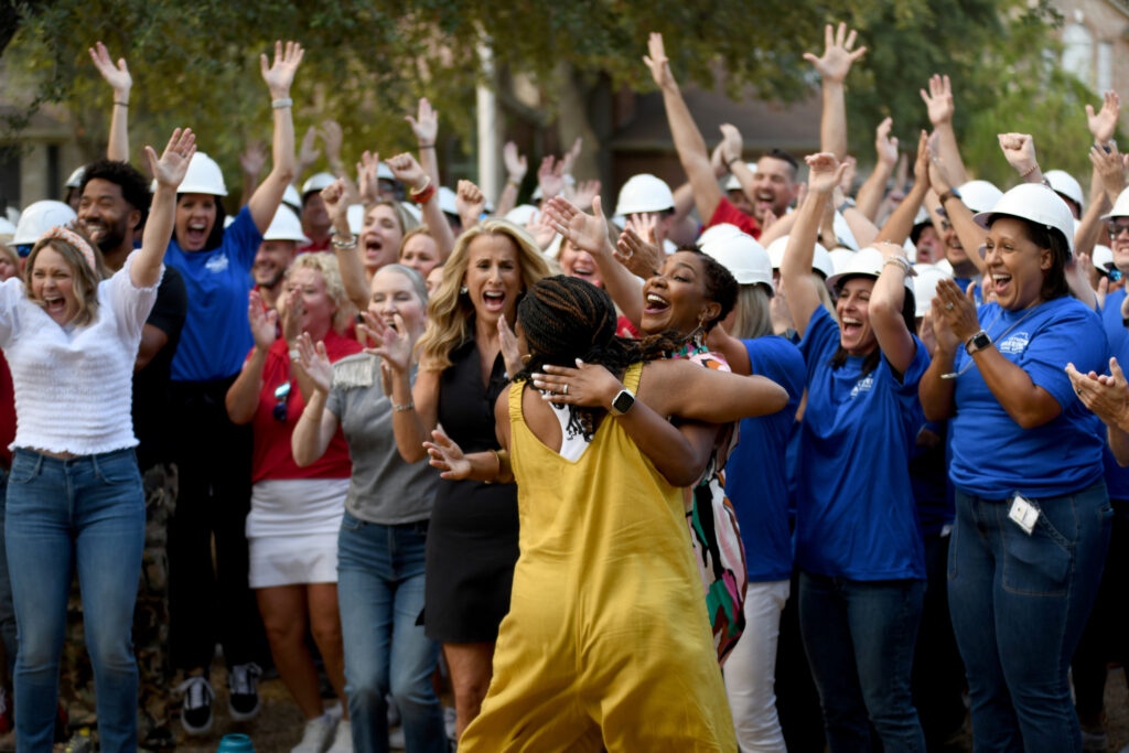 Extreme Makeover Home Edition team with LISD family and staff