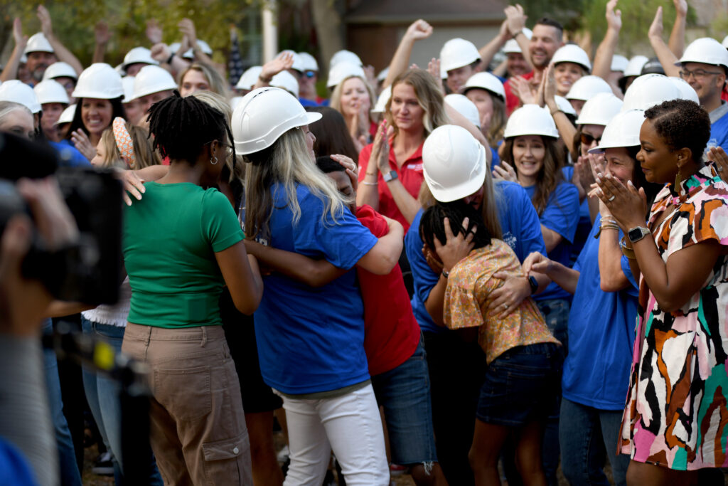 Extreme Makeover Home Edition team with LISD family and staff