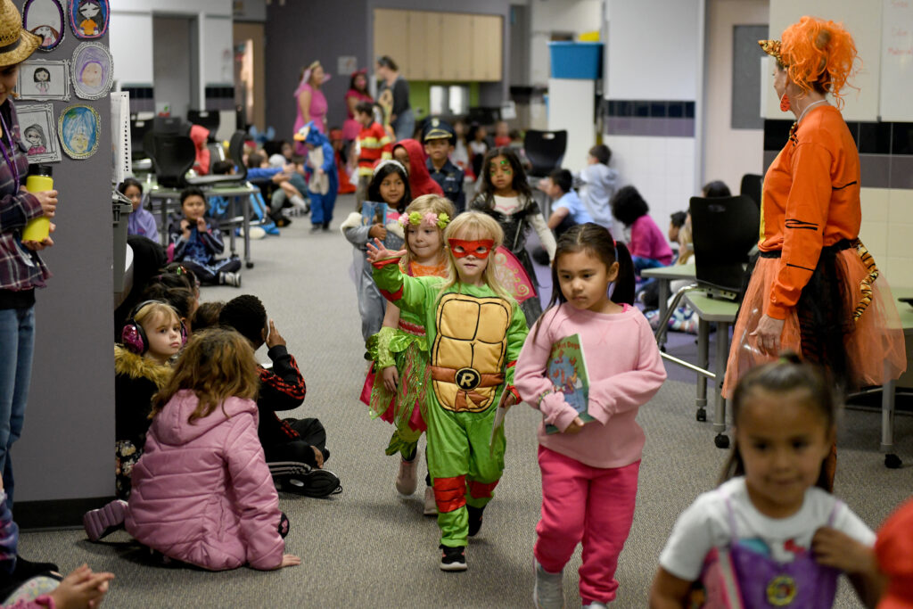 ES students and staff in Halloween costumes