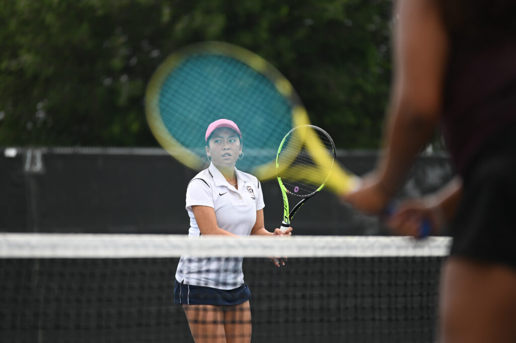 Glenn HS tennis player about to serve