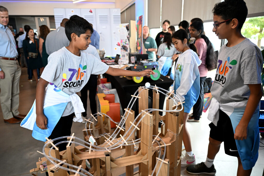 Students interacting with 3D project