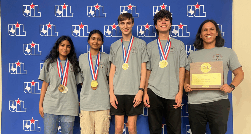 The Rouse HS team poses for a photo with their first place medals and award at the UIL State Academic Meet